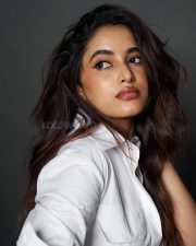 Stunning Priyanka Arul Mohan in a White Shirt and Black Shimmery Skirt Photos 02
