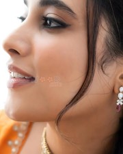 Stylish Priyanka Arul Mohan in an Orange Saree Photos 03
