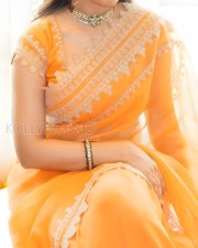 Stylish Priyanka Arul Mohan in an Orange Saree Photos 04