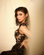 Super Stylish Mouni Roy in a Black Ankle Length Gown with a Front Slit Photos 04
