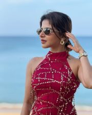 Tamil Rockerz Actress Iswarya Menon in a Red Sequined Halter Neck Bodycon Dress Pictures 01