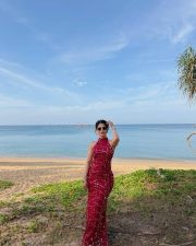 Tamil Rockerz Actress Iswarya Menon in a Red Sequined Halter Neck Bodycon Dress Pictures 03