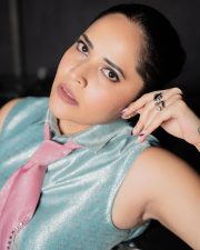 Telugu Television Presenter Anasuya Bharadwaj in a Metallic Green Sleeveless Crop Top and a Matching Mini Skirt Pictures 02