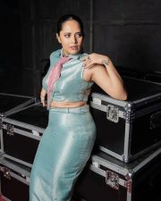 Telugu Television Presenter Anasuya Bharadwaj in a Metallic Green Sleeveless Crop Top and a Matching Mini Skirt Pictures 03