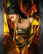 Tempting Iswarya Menon in a Shimmering Gold Metallic Slip Dress Pictures 04