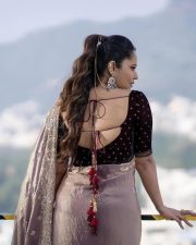 Tollywood Actress Anasuya Bharadwaj in a Muave and Silver Dual Tone Floral Butti Embroidery Saree with a Deep Wine Colored Velvet Blouse Pictures 01