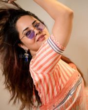Tollywood Beauty Anasuya Bharadwaj in an Orange Saree and Puple Sunglass Photos 02 Tollywood Beauty Anasuya Bharadwaj in an Orange Saree and Puple Sunglass Photos 02