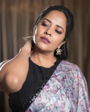 Wolf Actress Anasuya Bharadwaj in a Floral Printed Saree with a Black Halter Neck Blouse Pictures 04