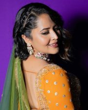 Wolf Actress Anasuya Bharadwaj in a Vibrant Orange Floor Length Anarkali Gown with a Green Organza Dupatta Photos 01