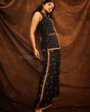 Actress Anupama Parameswaran in a Black Sleeveless Tree of Hearts Top with a Matching Palazzo Pants Photos 04