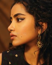 Actress Anupama Parameswaran in a Black Sleeveless Tree of Hearts Top with a Matching Palazzo Pants Photos 05