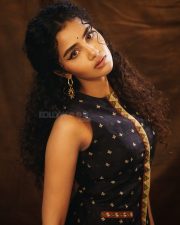 Actress Anupama Parameswaran in a Black Sleeveless Tree of Hearts Top with a Matching Palazzo Pants Photos 06