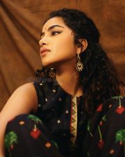 Actress Anupama Parameswaran in a Black Sleeveless Tree of Hearts Top with a Matching Palazzo Pants Photos 07