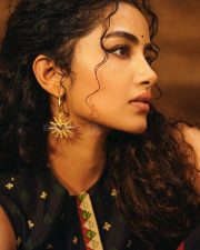 Actress Anupama Parameswaran in a Black Sleeveless Tree of Hearts Top with a Matching Palazzo Pants Photos 09