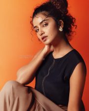Actress Anupama Parameswaran in a Black and Cedar Sheer Panel Maxi Skirt with a Sleeveless Black Top Pictures 03