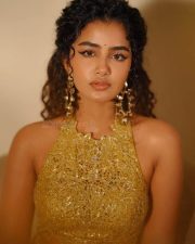 Actress Anupama Parameswaran in a Gold Sequined Halter Neck Top with a Matching Golden Skirt Pictures 02