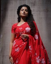 Actress Anupama Parameswaran in a Hibiscus Roses on Red Saree with Matching Red Short Sleeved Blouse Photos 02