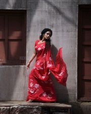Actress Anupama Parameswaran in a Hibiscus Roses on Red Saree with Matching Red Short Sleeved Blouse Photos 05