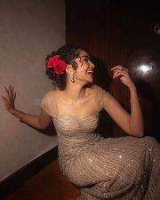 Actress Anupama Parameswaran in a Rose Champagne Gold Embroidered Gown Photos 09