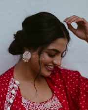 Actress Nikhila Vimal in a Red Silk Printed Cape and Skirt Photos 01