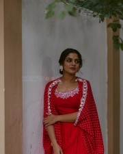 Actress Nikhila Vimal in a Red Silk Printed Cape and Skirt Photos 05