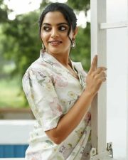 Actress Nikhila Vimal in a White Floral Dress Photos 02