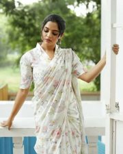 Actress Nikhila Vimal in a White Floral Dress Photos 04