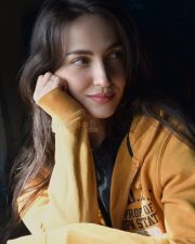 Actress and Dancer Elli Avrram in a Mustard Yellow Zip Up Hoodie Photos 01