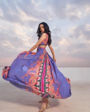 Alluring Neha Shetty in a Purple and Red Floral Mini Dress Pictures 01