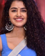 Anupama Parameswaran Smiling in a Blue Saree Photo 01