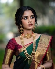 Anupama Parameswaran in a Traditional Green Silk Saree Photos 01