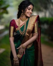 Anupama Parameswaran in a Traditional Green Silk Saree Photos 03