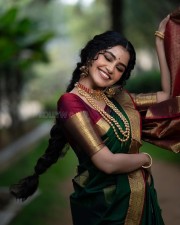 Anupama Parameswaran in a Traditional Green Silk Saree Photos 04