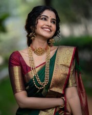 Anupama Parameswaran in a Traditional Green Silk Saree Photos 06