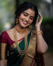 Anupama Parameswaran in a Traditional Green Silk Saree Photos 07