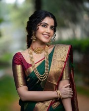 Anupama Parameswaran in a Traditional Green Silk Saree Photos 08