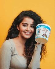Anupama Parameswaran posing with Peanut Butter Photo 01