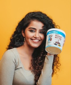 Anupama Parameswaran posing with Peanut Butter Photo 01
