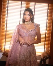 Arjun Son of Vyjayanthi Heroine Saiee Manjrekar in a Purple Embroidered Lehenga Set Photos 02