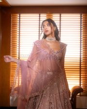 Arjun Son of Vyjayanthi Heroine Saiee Manjrekar in a Purple Embroidered Lehenga Set Photos 03