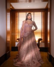 Arjun Son of Vyjayanthi Heroine Saiee Manjrekar in a Purple Embroidered Lehenga Set Photos 04