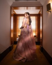 Arjun Son of Vyjayanthi Heroine Saiee Manjrekar in a Purple Embroidered Lehenga Set Photos 06