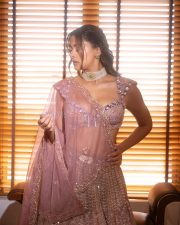 Arjun Son of Vyjayanthi Heroine Saiee Manjrekar in a Purple Embroidered Lehenga Set Photos 07