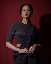 Attractive Anupama Parameswaran in a Black Charcoal Saree Style Full Sleeved Gown Stills 04