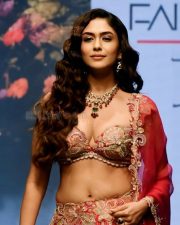 Attractive Mrunal Thakur in a Red Lehenga at Bombay Times Fashion Week Photos 02