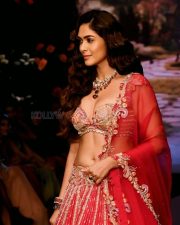 Attractive Mrunal Thakur in a Red Lehenga at Bombay Times Fashion Week Photos 03
