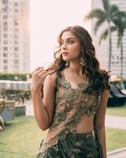 Attractive Saiee Manjrekar in an Olive Green and Maroon Pre Draped Saree with an Embellished Sleeveless Blouse Photos 02