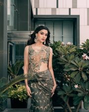Attractive Saiee Manjrekar in an Olive Green and Maroon Pre Draped Saree with an Embellished Sleeveless Blouse Photos 03
