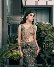 Attractive Saiee Manjrekar in an Olive Green and Maroon Pre Draped Saree with an Embellished Sleeveless Blouse Photos 04