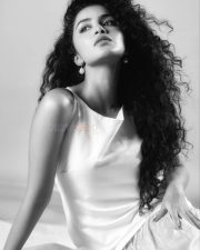 Beautiful Actress Anupama Parameswaran in a White Sleeveless Top with a Matching Flared Cotton Skirt Photos 03
